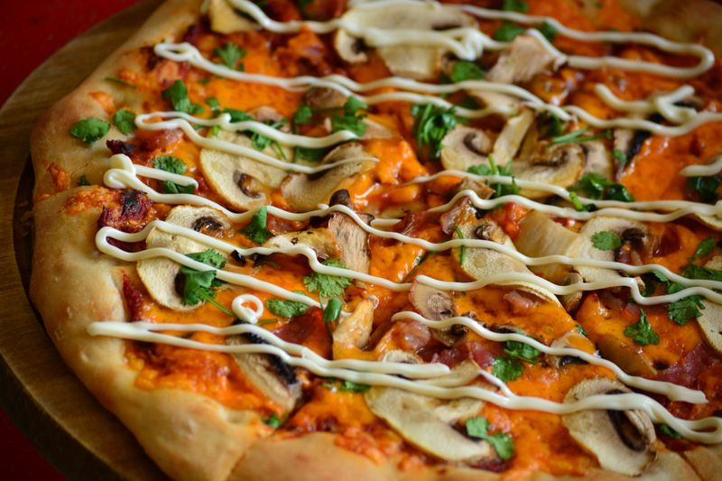 Crispy chicken wings tossed in buffalo sauce served at Pizza inn
